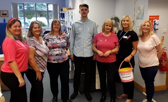 Members of the team fundraising on Breast Cancer Awareness Day